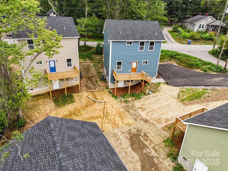Front exterior of a new home in , Asheville, NC, highlighting curb appeal (Image 27).