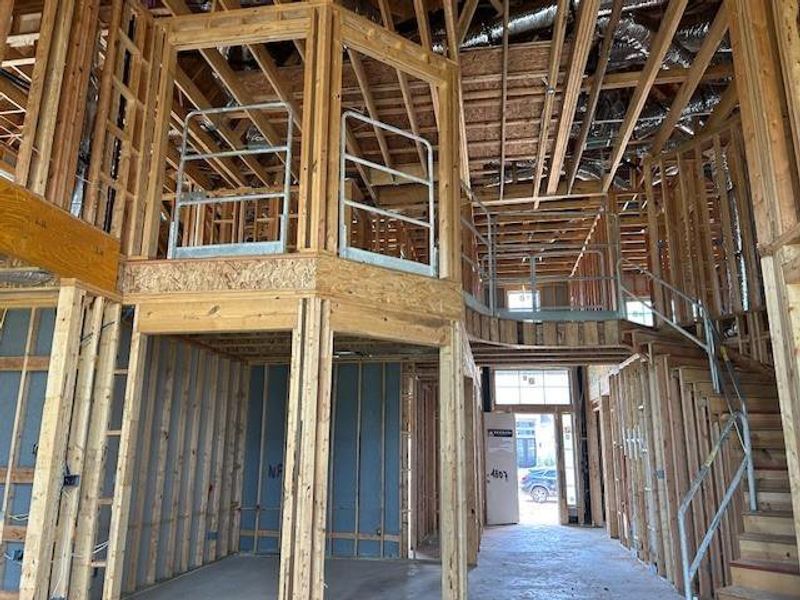 View from the family room of the gameroom above and dining below. View from the family room of the gameroom above and dining below.