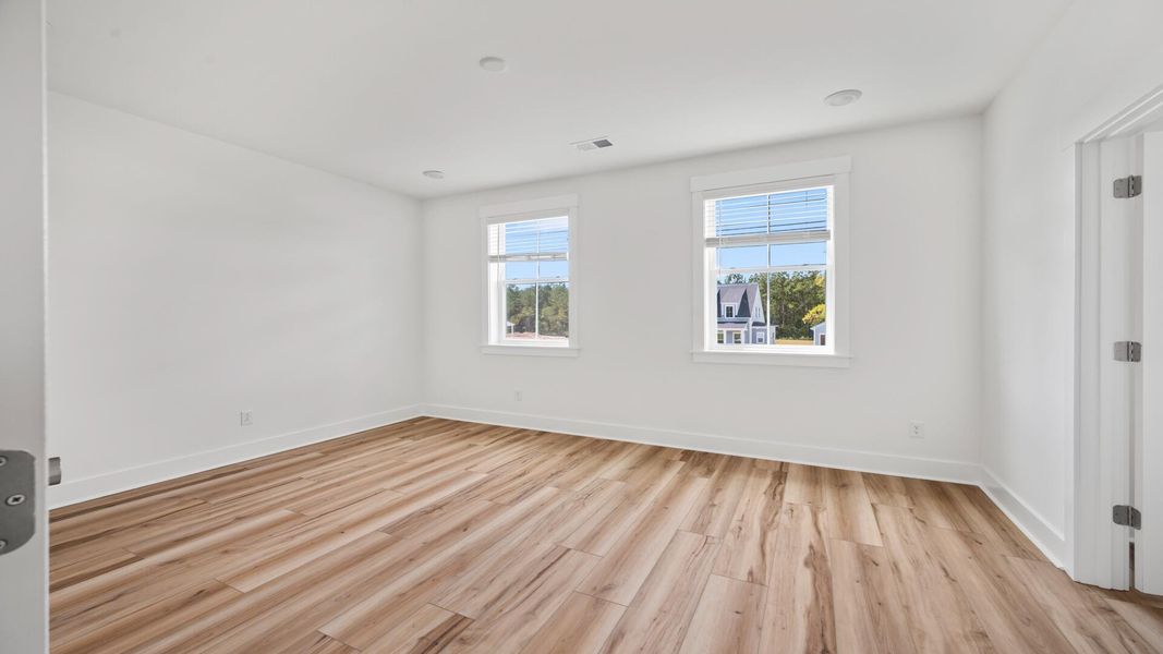 Spacious, unfurnished interior of a new home in Pamlico Terrace, Awendaw (Image 40).
