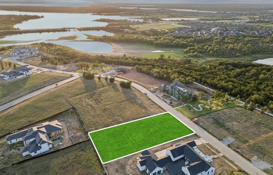 View of property location with property parcel outlined and a nearby body of water