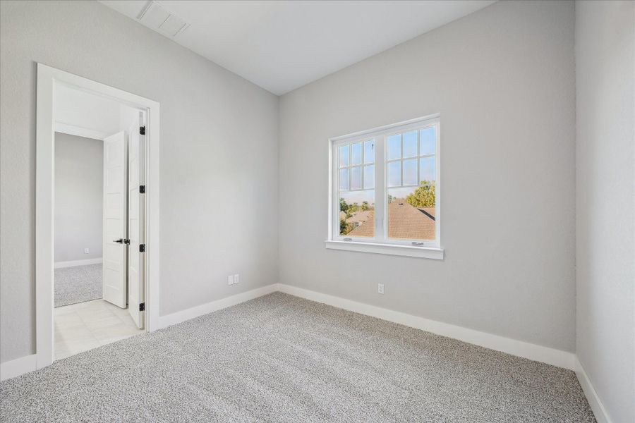 Bedroom #4 with Roll Out Windows & door to Hollywood Bath