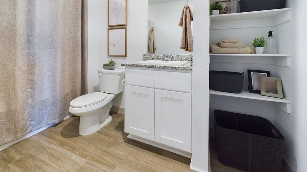 Representative furnished interior of a home built from the The Pierce by D.R. Horton in Overlook West, Wolfforth (Image 24).