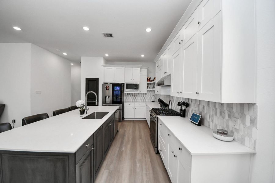 Furnished interior view inside a new home in The Trails, New Caney (Image 30).