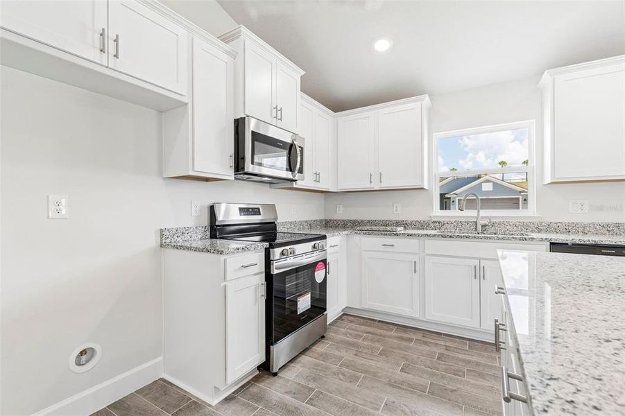 Furnished interior view inside a new home in Abbey Glen, Dade City (Image 8).