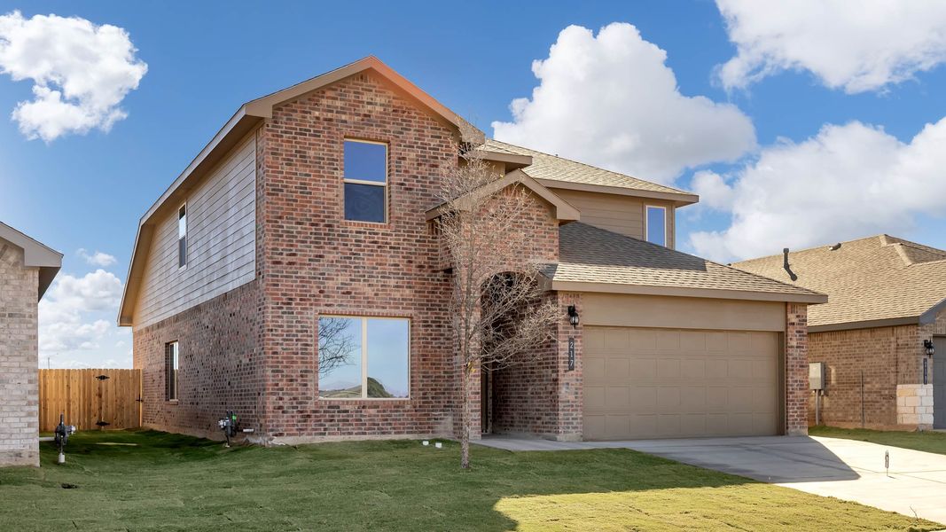Front exterior of a new home in Overlook West, Wolfforth, TX, highlighting curb appeal (Image 18).