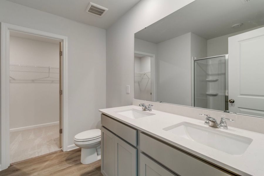 Owner's Bath with a large walk-in closet.