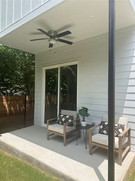 A tranquil covered patio, perfect for enjoying outdoor moments with direct backyard access. A tranquil covered patio, perfect for enjoying outdoor moments with direct backyard access.