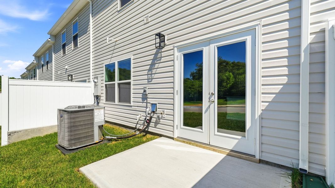 Exterior details and patio area of a home in The Arbor Townhomes, Kingsport (Image 4). Exterior details and patio area of a home in The Arbor Townhomes, Kingsport (Image 4).
