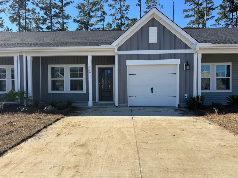 Front exterior of a new home in Hammock Walk at Nexton, Summerville, SC, highlighting curb appeal (Image 2). Front exterior of a new home in Hammock Walk at Nexton, Summerville, SC, highlighting curb appeal (Image 2).