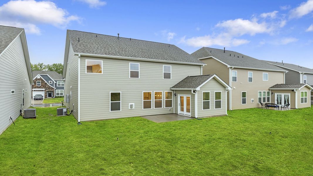Exterior details and patio area of a home in Whitehawk Meadows, Travelers Rest (Image 3).