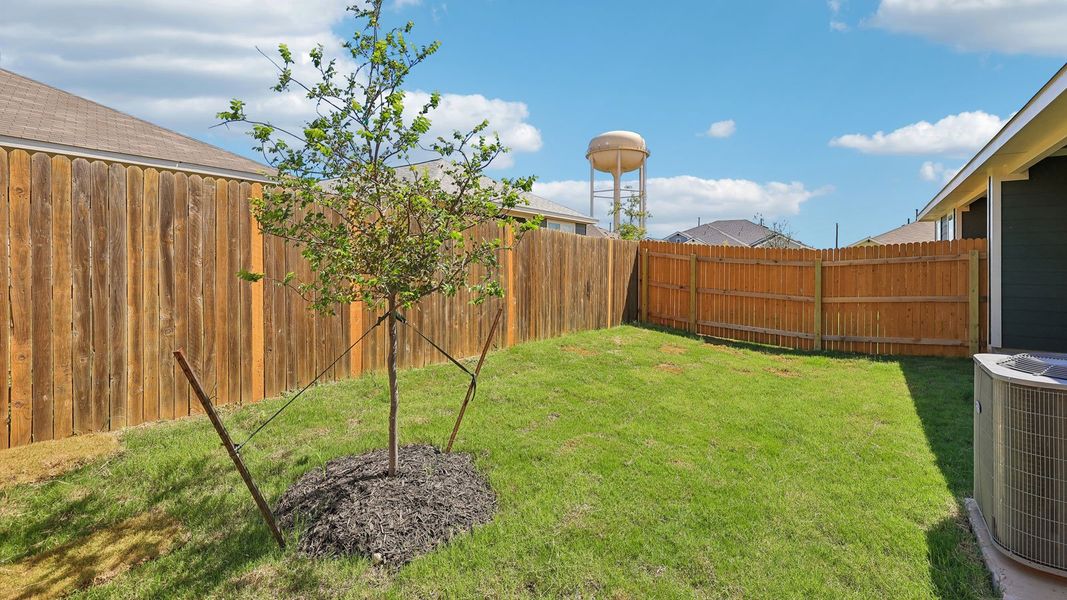 Exterior details and patio area of a home in Wayside, Uhland (Image 3).