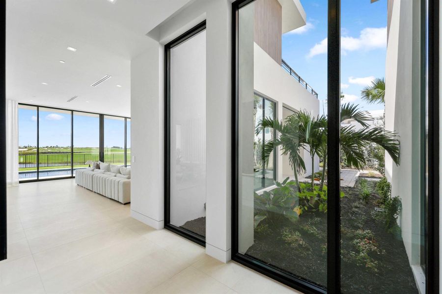 Exterior details and patio area of a home in , Palm Beach Gardens (Image 36).