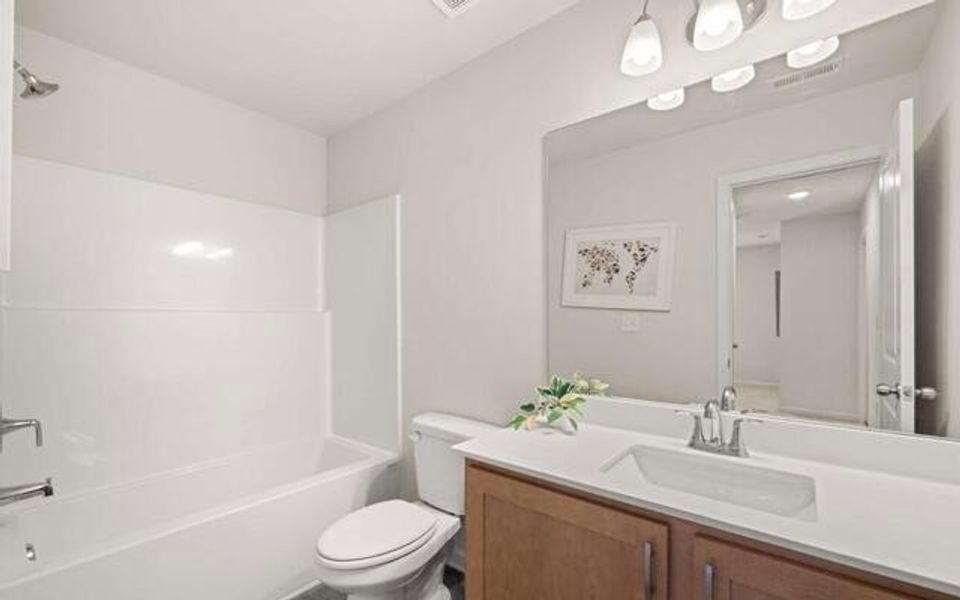 Furnished interior view inside a new home in Walden Park - The Retreat, Jonesboro (Image 24).