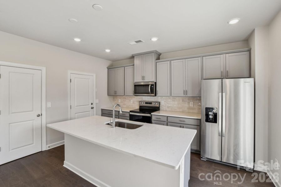 Photo is not of the actual home, but is an inspirational photo of builder’s model home and may depict options, furnishings, and/or decorator features that are not included