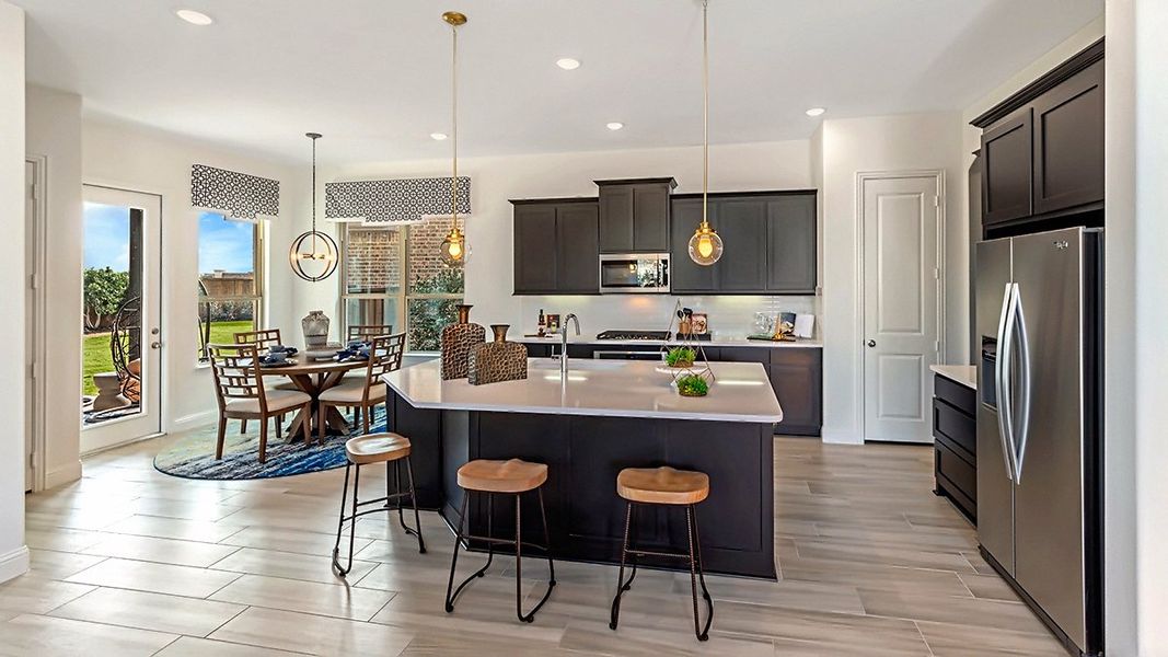 Representative furnished interior of a home built from the Whitney by Beazer Homes in Treeline, Justin (Image 6).