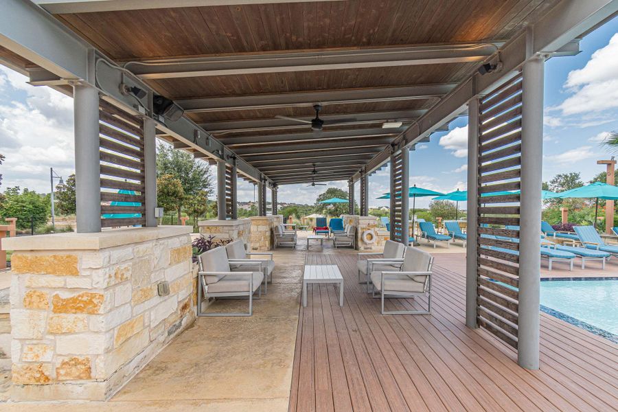 An inviting covered patio offers a comfortable lounge area by the pool, ideal for relaxation. An inviting covered patio offers a comfortable lounge area by the pool, ideal for relaxation.