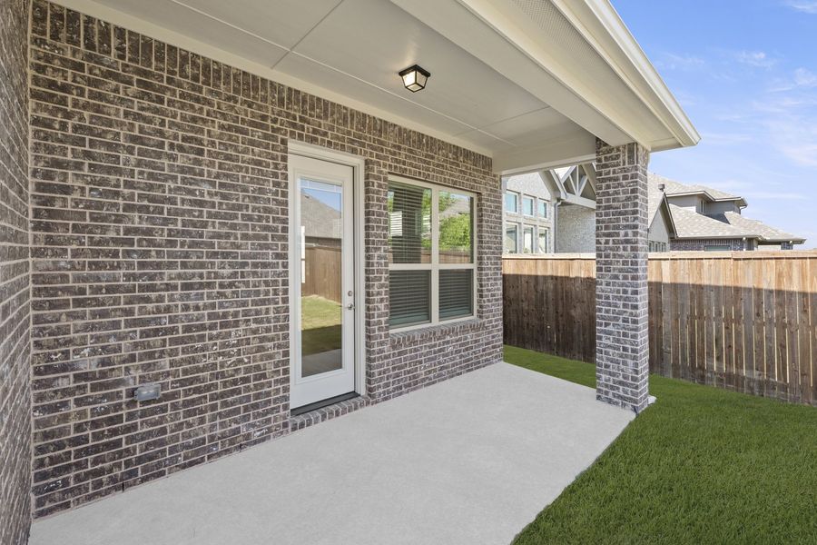 Exterior details and patio area of a home in Lake Shore Village, Rowlett (Image 3). Exterior details and patio area of a home in Lake Shore Village, Rowlett (Image 3).