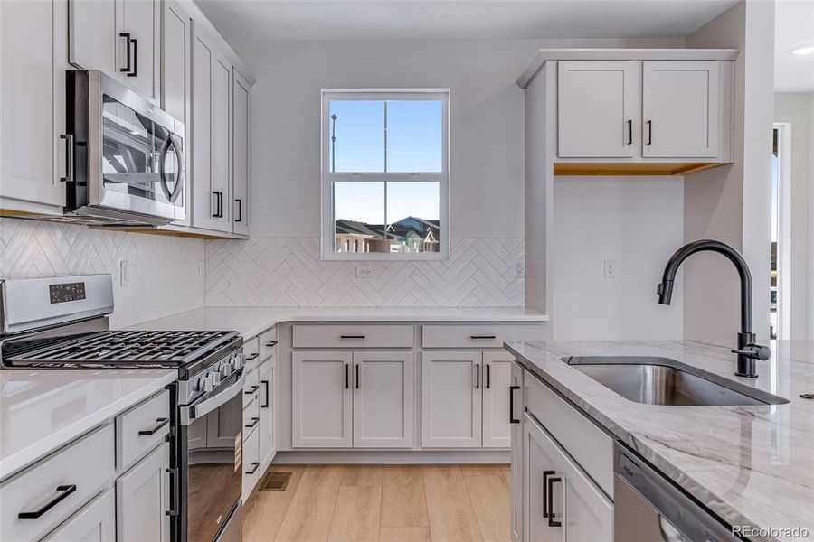 Furnished interior view inside a new home in Painted Prairie, Aurora (Image 8). Furnished interior view inside a new home in Painted Prairie, Aurora (Image 8).