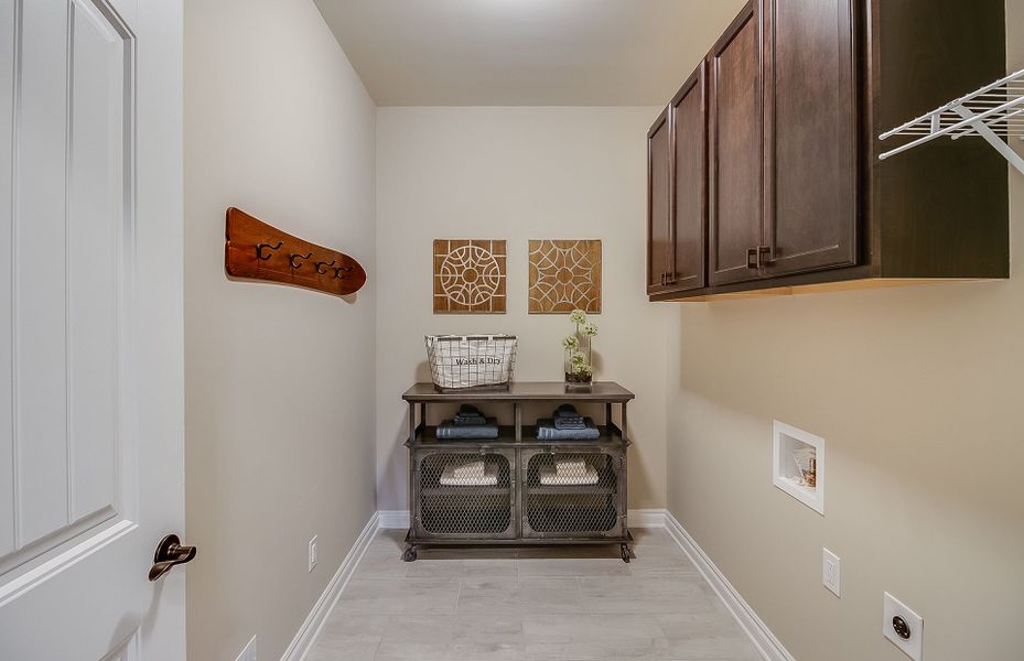 Large Laundry Room with upper storage cabinets and Large Laundry Room with upper storage cabinets and