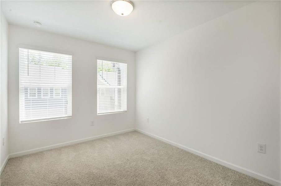 Spacious, unfurnished interior of a new home in Laurelwood, Douglasville (Image 24).