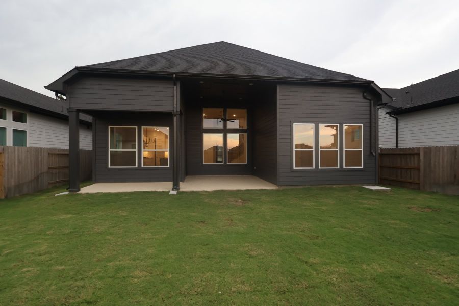 Exterior details and patio area of a home in ARTAVIA - Enclave Collection, Conroe (Image 3).