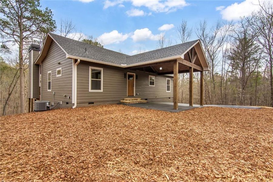 Exterior details and patio area of a home in , Ellijay (Image 26).