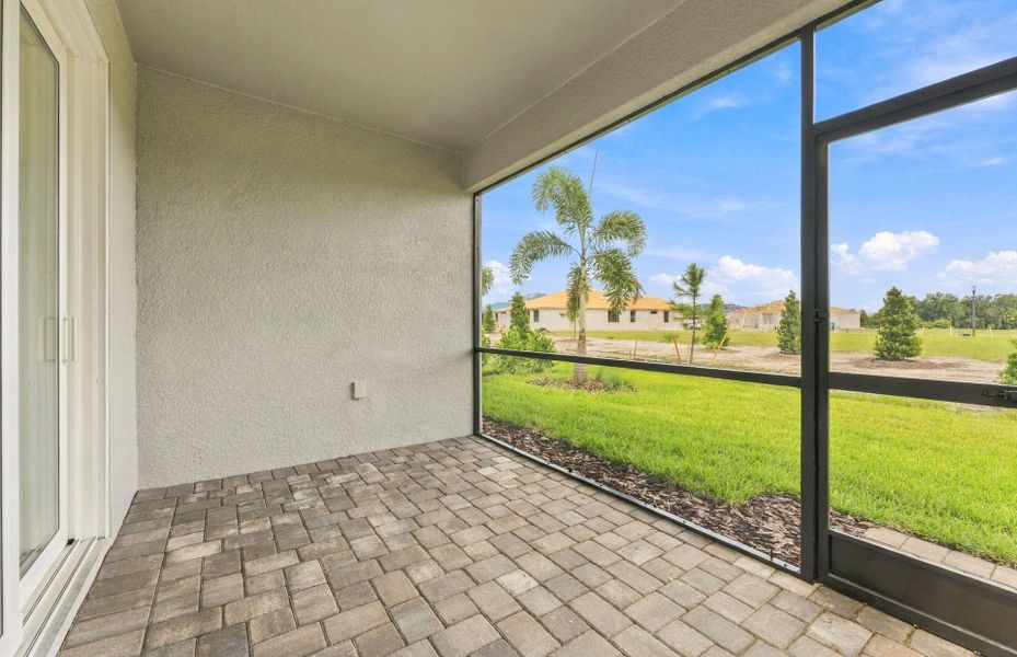 Exterior details and patio area of a home in Explore North River Ranch, Parrish (Image 3).