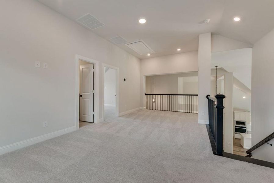 Representative unfurnished interior of a home built from the Brandonwood by Grand Homes in Edgewater, Fate (Image 24).
