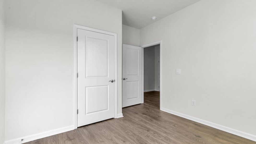 Representative unfurnished interior of a home built from the CLIFTON by D.R. Horton in The Villas at Galvins Ridge, Sanford (Image 18). Representative unfurnished interior of a home built from the CLIFTON by D.R. Horton in The Villas at Galvins Ridge, Sanford (Image 18).