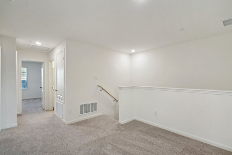 Representative unfurnished interior of a home built from the Crescent by Starlight Homes in Broadmoor Village, Cedar Hill (Image 23).