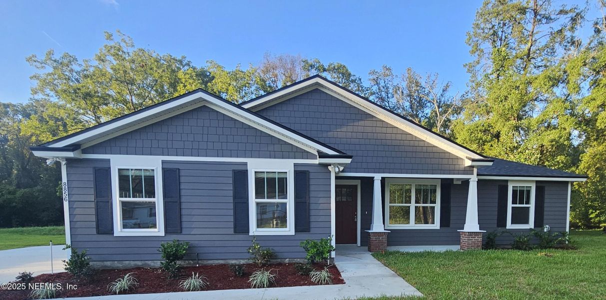Front exterior of a new home in , Jacksonville, FL, highlighting curb appeal (Image 24).