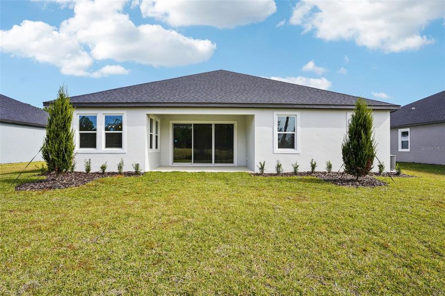 Exterior details and patio area of a home in , Ormond Beach (Image 23).