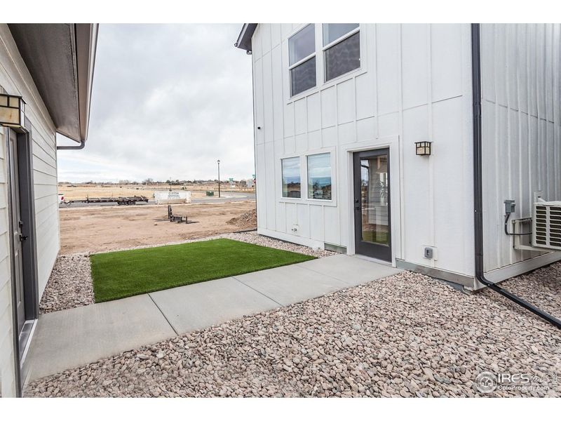 Exterior details and patio area of a home in Prairie Song Story Collection - Single Family Homes, Windsor (Image 20).