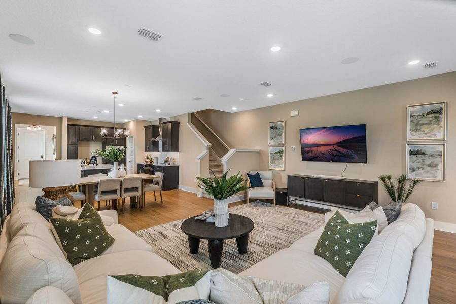 Furnished interior view inside a new home in Harvest at Ovation - Townhomes, Winter Garden (Image 11).