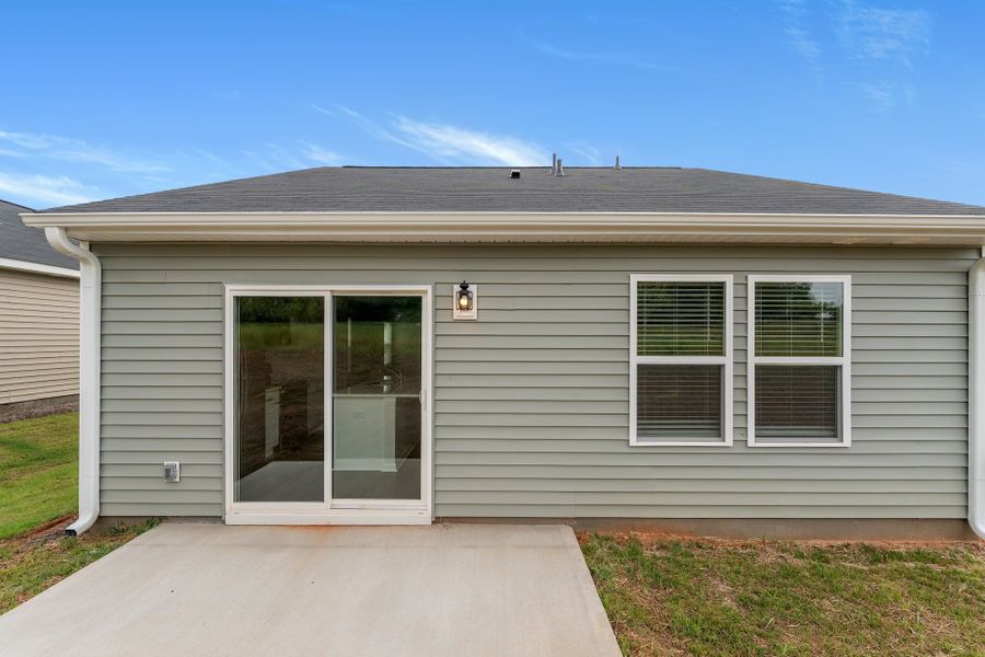Exterior details and patio area of a home in Evergreen, Spartanburg (Image 4).