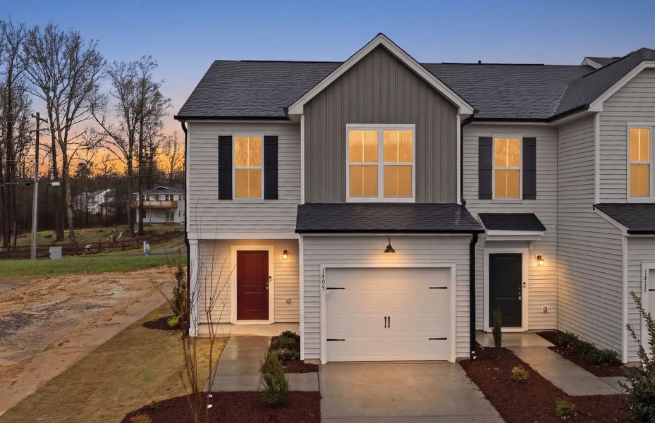 Front exterior of a new home in Flemingfield, Greensboro, NC, highlighting curb appeal (Image 27).