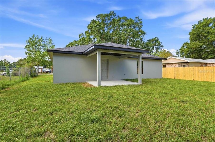 Exterior details and patio area of a home in , Auburndale (Image 32).