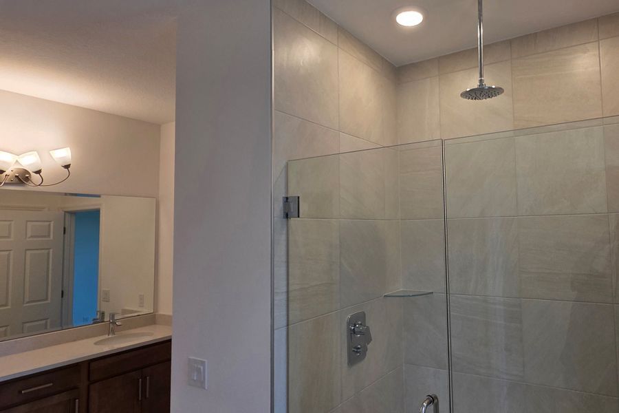 Elegant Primary Bathroom with Upgraded Finishes in Central Florida Home