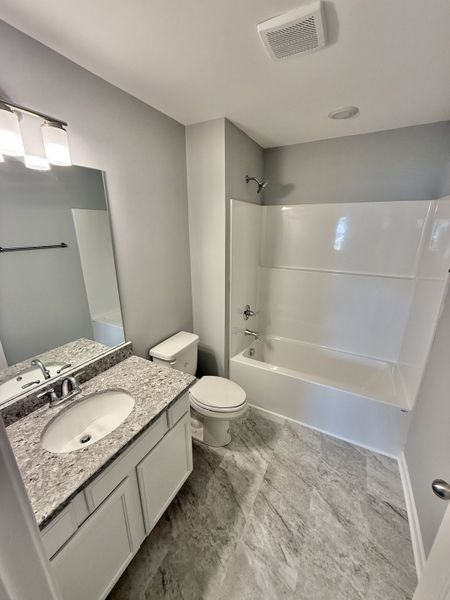 Furnished interior view inside a new home in Stone Fort Meadows, Manchester (Image 5).