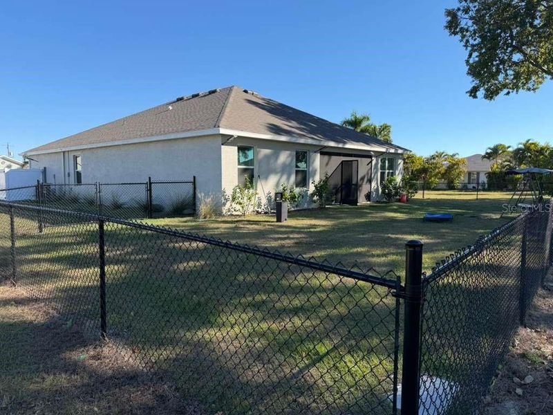 Exterior details and patio area of a home in Burnt Store Village, Punta Gorda (Image 19).