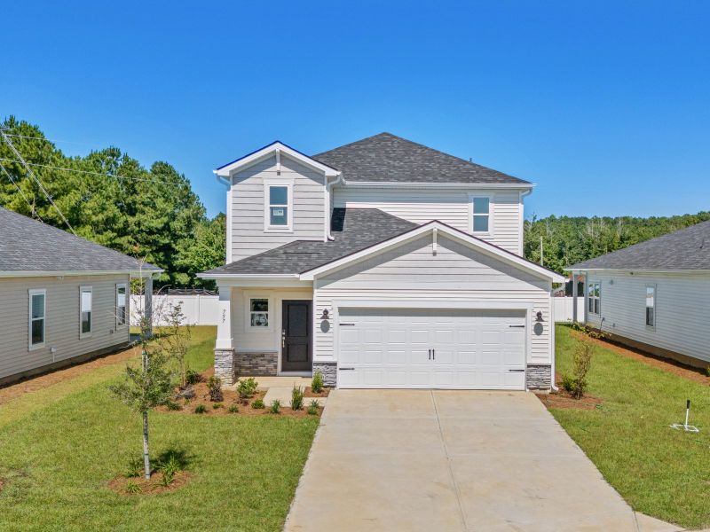 Front exterior of a new home in Cypress Ridge - The Boardwalk Series, Longs, SC, highlighting curb appeal (Image 1).