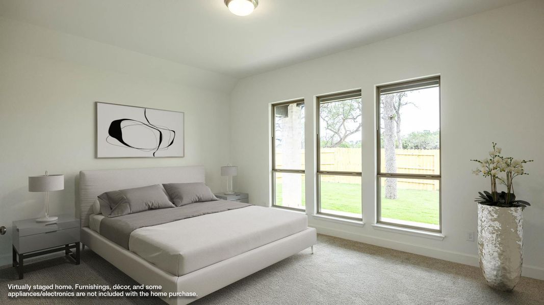 Bedroom with carpet and baseboards