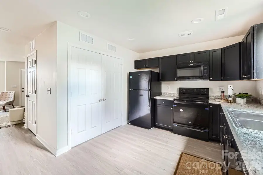 Furnished interior view inside a new home in , Charlotte (Image 6).