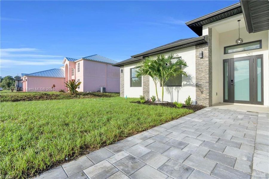 Exterior details and patio area of a home in , Lehigh Acres (Image 3). Exterior details and patio area of a home in , Lehigh Acres (Image 3).