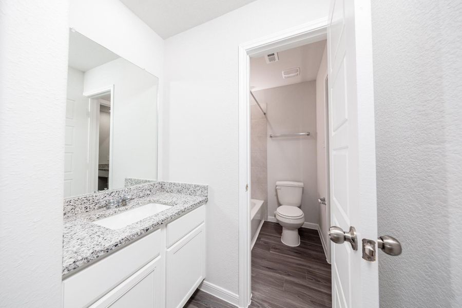 Furnished interior view inside a new home in Granger Pines, Conroe (Image 9).