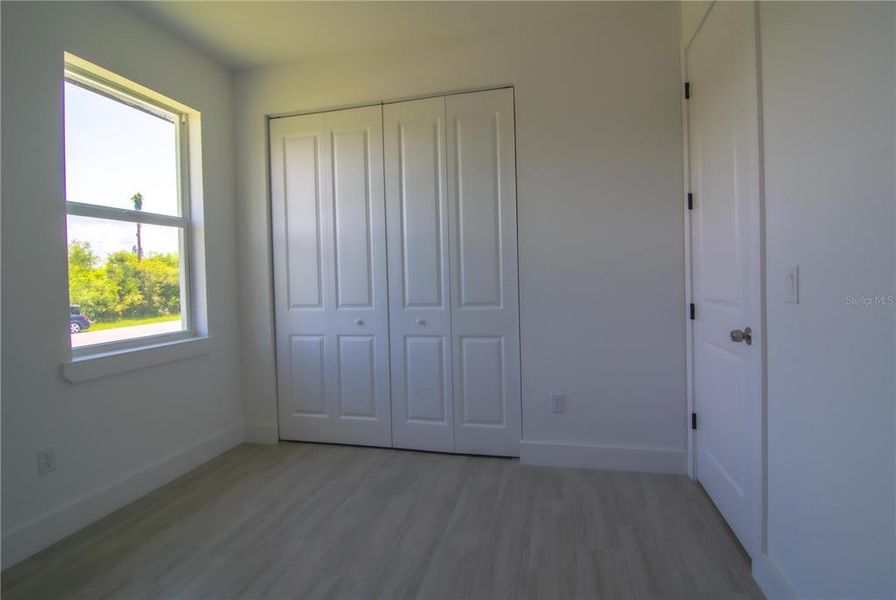 Spacious, unfurnished interior of a new home in , Port Charlotte (Image 15).