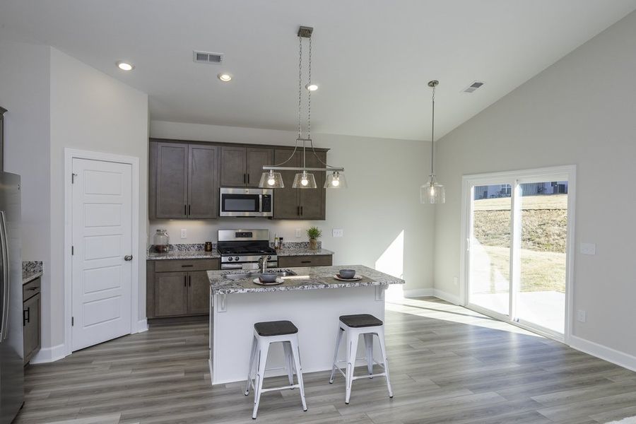 Representative furnished interior of a home built from the The Hunter by Cothran Homes in Holly Ridge, Greenville (Image 5).
