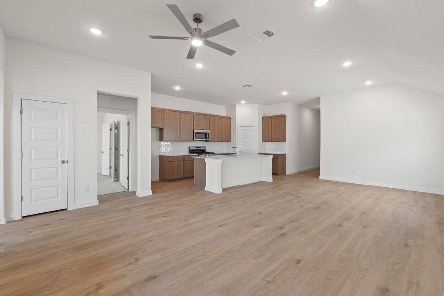 Kitchen in the Quartz home plan by Trophy Signature Homes – REPRESENTATIVE PHOTO