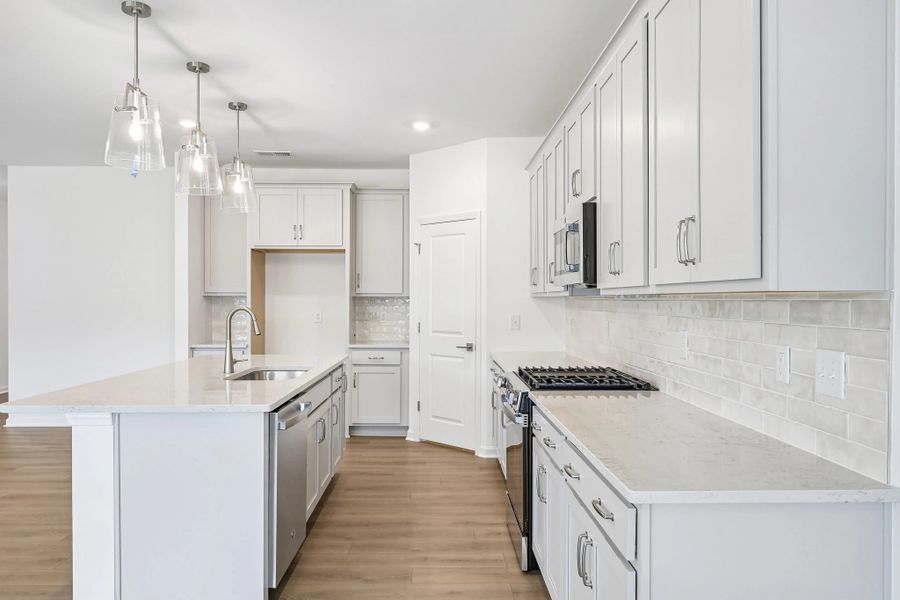 Kitchen featuring the AW Collection® Milan - Chic gray finishes and smooth surfaces shine.