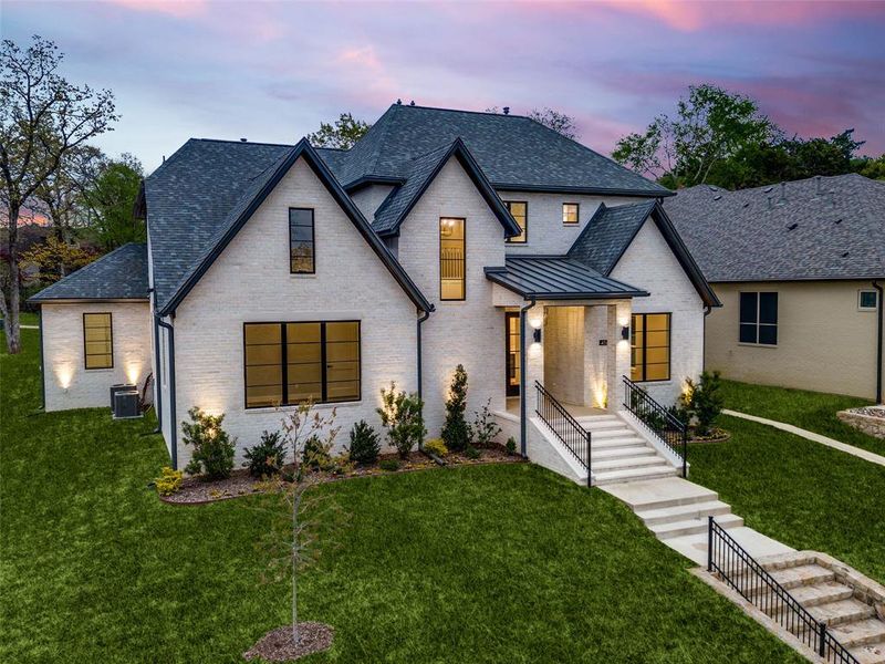 Front exterior of a new home in , Tyler, TX, highlighting curb appeal (Image 1).